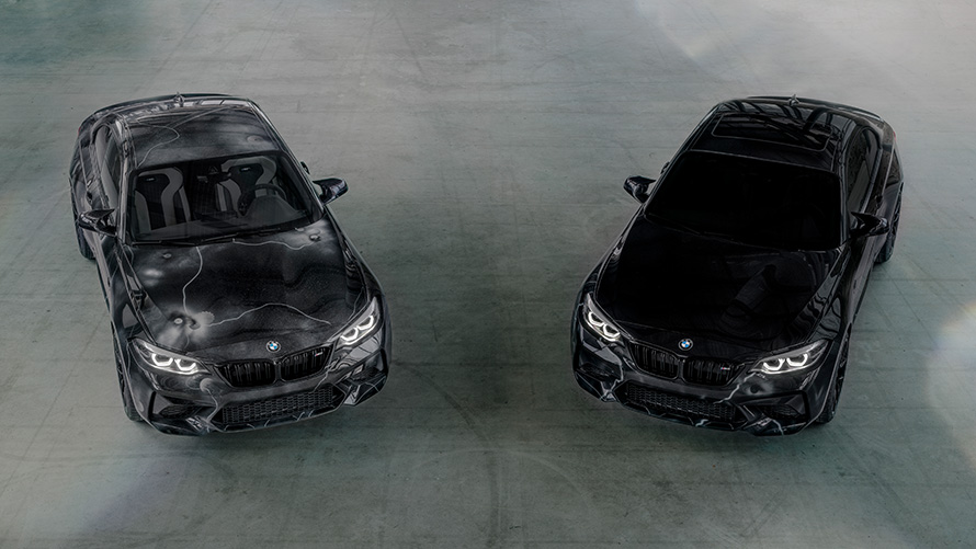 Two models BMW M2 Edition designed by FUTURA 2000 F87 2020 BMW M2 Edition designed by FUTURA 2000 F87 2020 two models in V-formation top view on grey ground